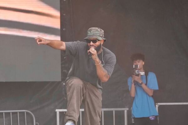 Larry June performs Saturday afternoon at the Sprite stage at the 2024 One Musicfest in Central Park. The San Francisco rapper put out his debut album in 2010, and released a whopping six projects in 2020.