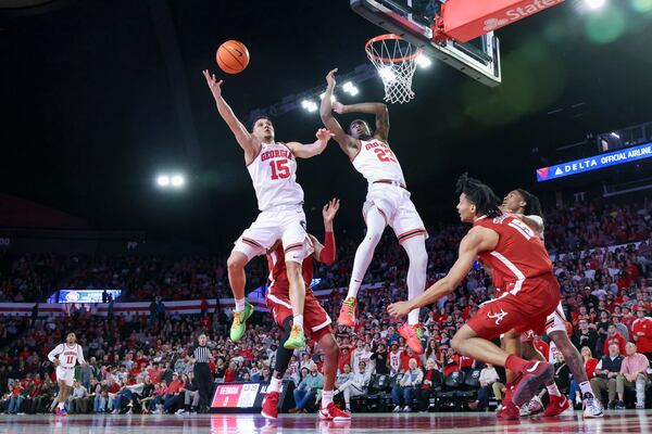 Georgia guard RJ Melendez (15) grabs a rebound next to Georgia forward Jalen DeLoach (23) during the first half against Alabama at Stegemen Coliseum, Wednesday, January 31, 2024, in Athens, Ga. Alabama won against Georgia 85-76. (Jason Getz / jason.getz@ajc.com)