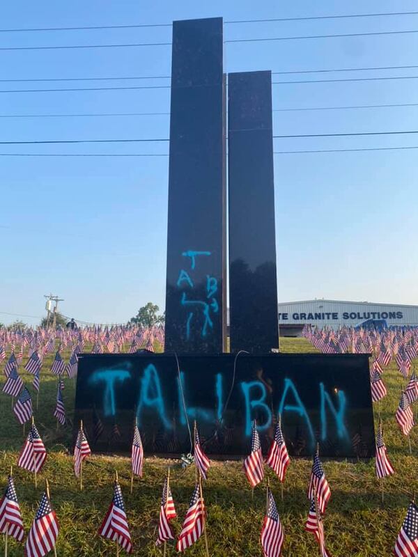 A surveillance camera recorded the person who vandalized a 9/11 memorial in Greenville, South Carolina, according to the Greenville County Sheriff's Office.