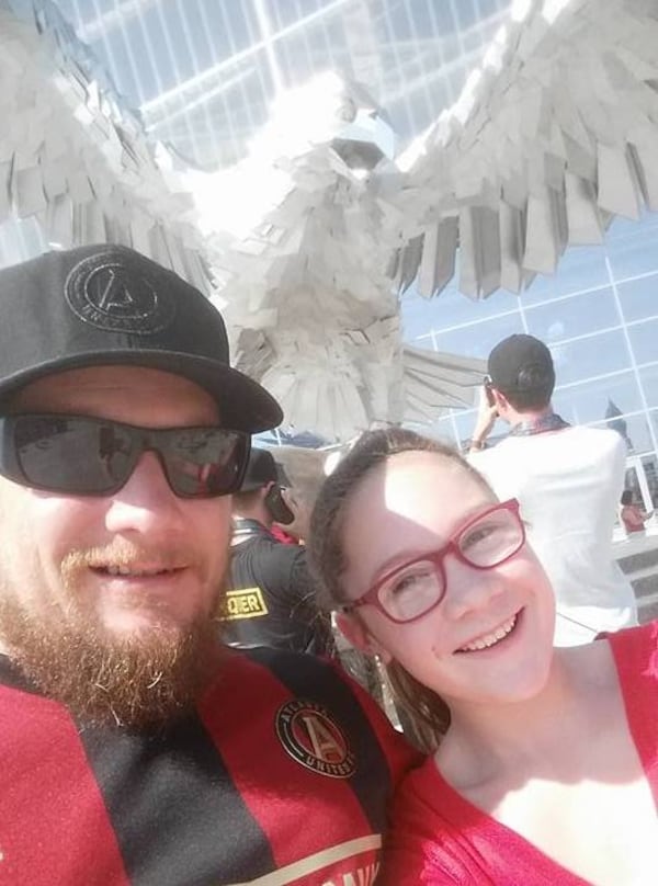 Atlanta Untied fan Josh Proctor and daughter Taylor at an Atlanta United match at Bobby Dodd Stadium. (Photo courtesy of Josh Proctor)