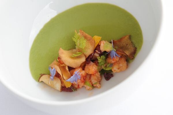 Chilled English pea puree crawfish, citrus, tarragon, sunchoke chips. (Beckysteinphotography.com)