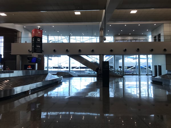 July 22, 2020 - The escalators to the first pedestrian bridge to the parking deck at Terminal North are near baggage carousel 3. Credit: Kelly Yamanouchi