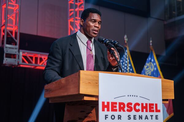 When Republican Herschel Walker waged a challenge against Raphael Warnock in 2022, the Democratic senator distanced himself from President Joe Biden and his low approval rating in the state. Warnock said voters were more interested in where Walker and he differed on pocketbook issues. (Arvin Temkar/The Atlanta Journal-Constitution/TNS)