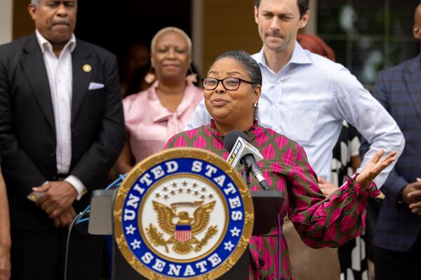 Cynthia Jenkins, CEO of Southern Crescent Habitat for Humanity, speaks at a press conference on housing funds led by U.S. Sen. Jon Ossoff, D-Ga, in Lovejoy on Monday, May 6, 2024. (Arvin Temkar / AJC)