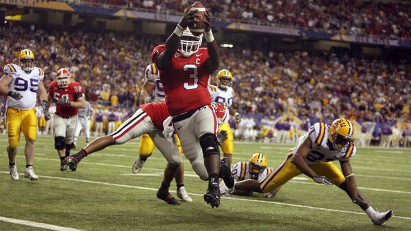 UGA quarterback D.J. Shockley (3) runs into the end zone for a score in the 2nd quarter against the LSU Tigers at the 2005 SEC Championship game at the Georgia Dome in Atlanta.