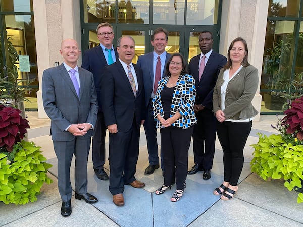 From left to right: Joe Seconder, John Heneghan, Jim Riticher, Tom Lambert, Lynn Deutsch, Ardy Bastien and Stacey Harris.