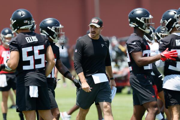 
Falcons defensive coordinator Ryan Nielsen, center, instructs players during OTAs at the Atlanta Falcons Training Camp, Wednesday, June 7, 2023, in Flowery Branch. (Miguel Martinez / miguel.martinezjimenez@ajc.com)