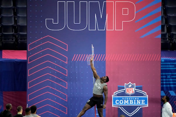 FILE - Clemson defensive lineman Ruke Orhorhoro takes part in the vertical jump during the NFL football scouting combine, Thursday, Feb. 29, 2024, in Indianapolis. (AP Photo/Charlie Riedel, File)