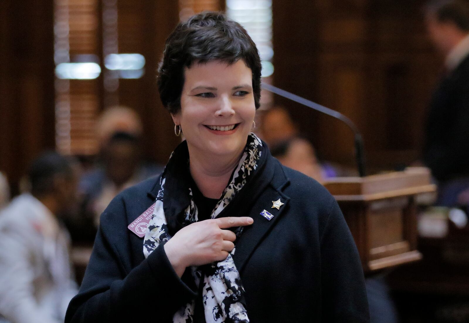 Mar. 30,  2017 - Atlanta - Rep. Mandi L. Ballinger, R - Canton,  points to her new rules committee badge after the house insisted on it's version of the "Campus Carry" legislation which she sponsored.  The 40th and final legislative day of the 2017 General Assembly.   BOB ANDRES  /BANDRES@AJC.COM