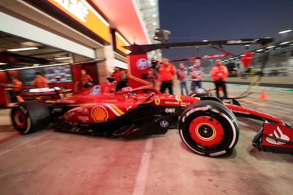 Ferrari driver Charles Leclerc of Monaco leaves the pit during practice at the Lusail International Circuit in Lusail, Qatar, ahead of the Qatar Formula One Grand Prix, Friday, Nov. 29, 2024. (AP Photo/Darko Bandic)