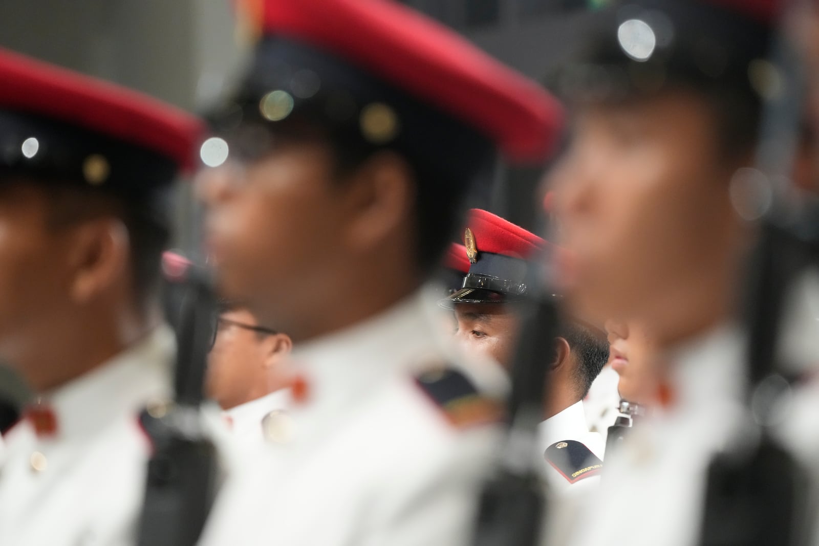 The guard of honor is lined up awaiting the arrival of Pope Francis for a welcome ceremony with the President of the Singapore Republic Tharman Shanmugaratnam at the Parliament House in Singapore, Thursday, Sept. 12, 2024. Pope Francis flew to Singapore on Wednesday for the final leg of his trip through Asia, arriving in one of the world's richest countries from one of its poorest after a record-setting final Mass in East Timor. (AP Photo/Gregorio Borgia)