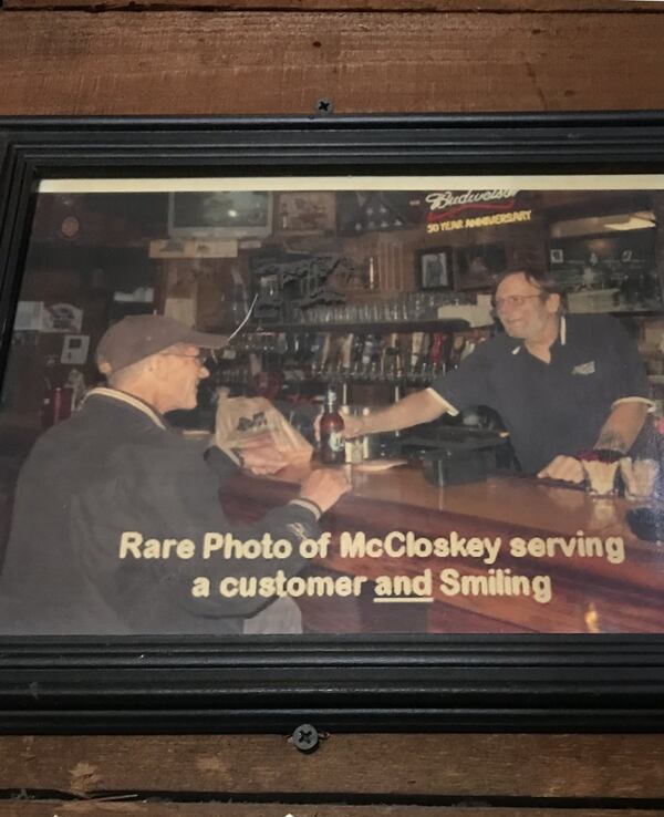 The recently deceased Bill McCloskey (right) worked at Manuel’s Tavern for nearly 50 years. His longtime colleague, Bobby Agee, remembers him as “a grumpy teddy bear.” LIGAYA FIGUERAS / LFIGUERAS@AJC.COM