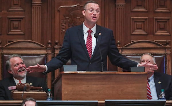 Georgia House Rep. Terry England (left) and House Speaker David Ralston (right) listen to U.S. Rep. Doug Collins (center) address the Georgia House in downtown Atlanta on Jan. 28, 2020, just hours after news broke that Collins is preparing to challenge U.S. Sen. Kelly Loeffler. (JOHN SPINK/ATLANTA JOURNAL-CONSTITUTION.)