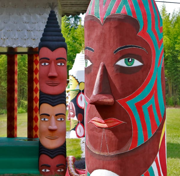 July 22,  2016 - Buena Vista, GA  - Painted totems depicting Pasaquoyans appear throughout the site.  Pasaquan is an art installation created by the late visionary artist Eddie Owens Martin in Buena Vista, Ga. The grounds features six buildings and 900 feet of cement fencing, all covered inside and out with colorful paintings. The site had fallen into disrepair, but starting in 2014 the Kohler Foundation began funding the restoration of the site, which has been given to Columbus State University to maintain when it reopens in October.   BOB ANDRES  / BANDRES@AJC.COM