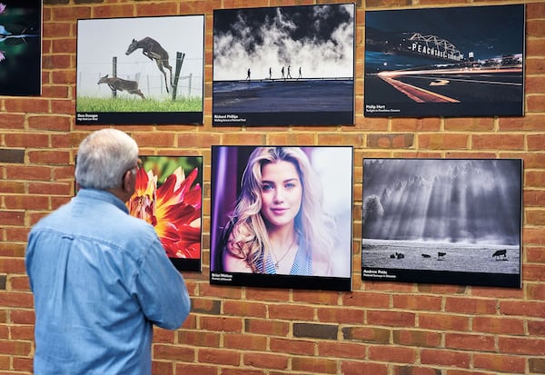 The Peachtree Corners Photography Club photo exhibit Hero Wall. Photo courtesy of Brian Walton Photography