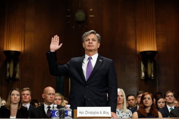 FBI Director nominee Christopher Wray is sworn-in on Capitol Hill in Washington, Wednesday, July 12, 2017, prior to testifying at his confirmation hearing before the Senate Judiciary Committee. (AP Photo/Pablo Martinez Monsivais)