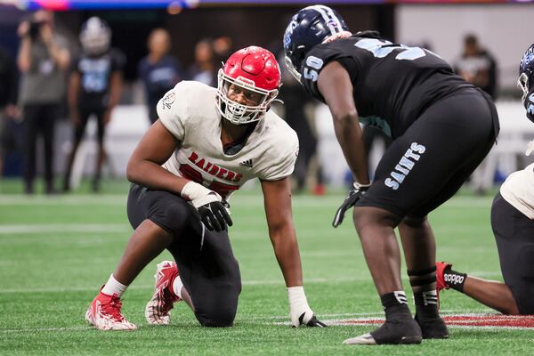 Savannah Christian defensive lineman Elijah Griffin (95) lines up for a play against Cedar Grove during the Class 3A GHSA State Championship game at Mercedes-Benz Stadium, Wednesday, December. 13, 2023, in Atlanta. (Jason Getz / Jason.Getz@ajc.com)