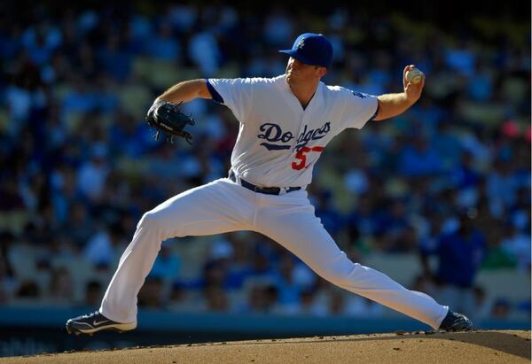 The Braves traded starter Alex Wood as part of the multi-player package they sent to the Dodgers to acquire 30-year-old rookie Hector Olivera. (AP photo)