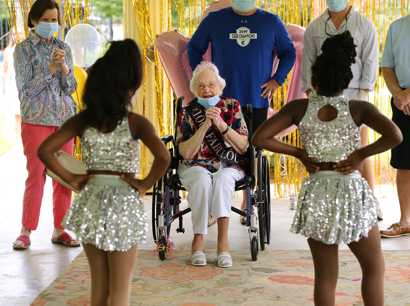 Photos: COVID-19 survivor celebrates 100th birthday