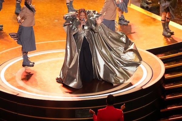 Queen Latifah, center, performs "Ease on Down the Road" during the Oscars on Sunday, March 2, 2025, at the Dolby Theatre in Los Angeles. (AP Photo/Chris Pizzello)