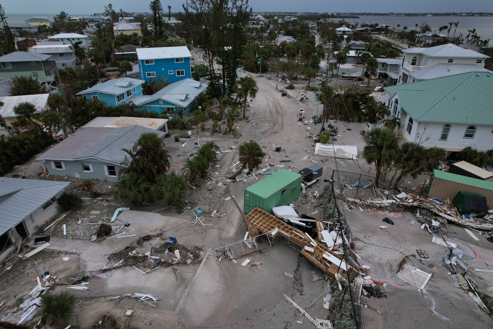 Debris lies scattered on Manasota Key, Fla., following the passage of Hurricane Milton, Friday, Oct. 11, 2024. (AP Photo/Rebecca Blackwell)