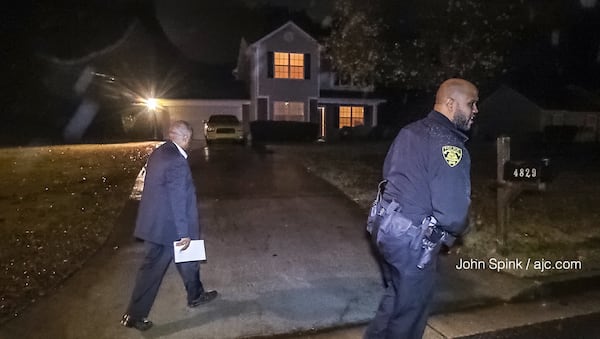 Police investigate a shooting at a home on Brookwood Place in the city of South Fulton early Tuesday morning. JOHN SPINK / JSPINK@AJC.COM