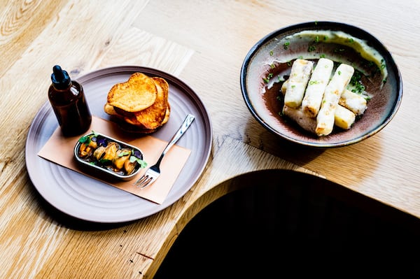 Chilled Mussels en Escabeche (left) and Crispy Eggplant are great ways to start a meal at Redbird. 