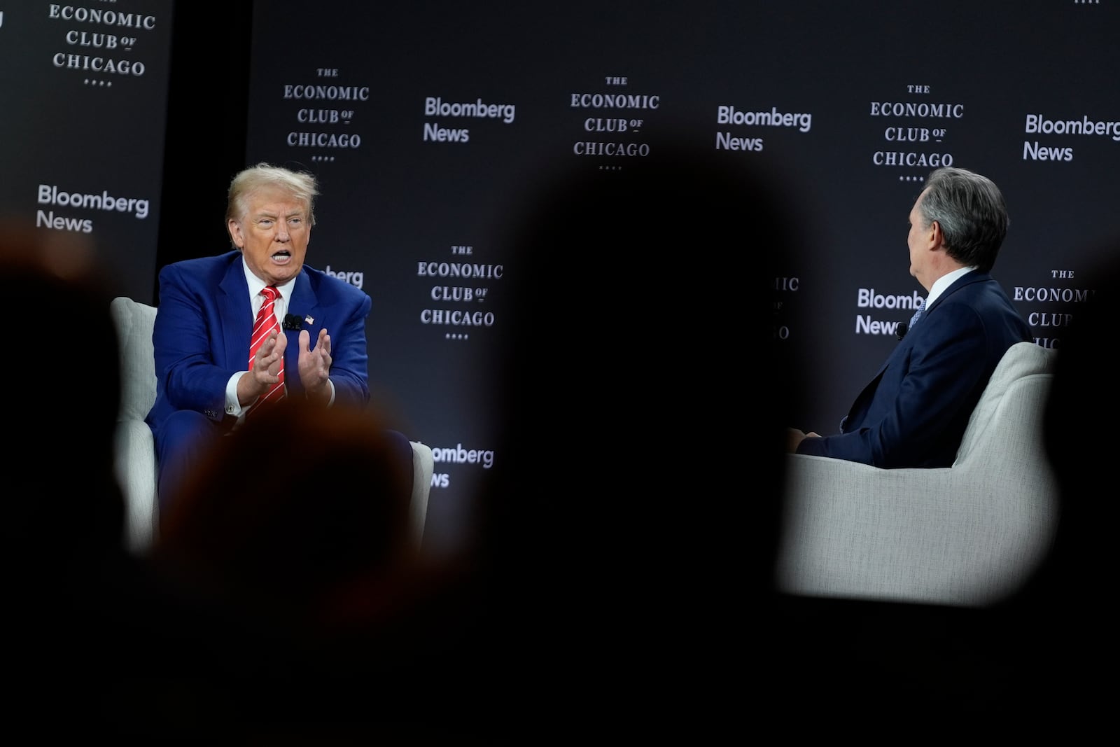 Republican presidential nominee former President Donald Trump speaks during an interview with Bloomberg News Editor-in-Chief John Micklethwait during an event with the Economic Club of Chicago, Tuesday, Oct. 15, 2024, in Chicago. (AP Photo/Evan Vucci)