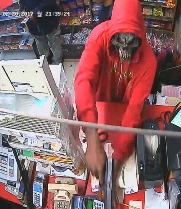 Atlanta police say the gunman wore a red hoodie during an armed robbery Monday. (Credit: Atlanta Police Department)