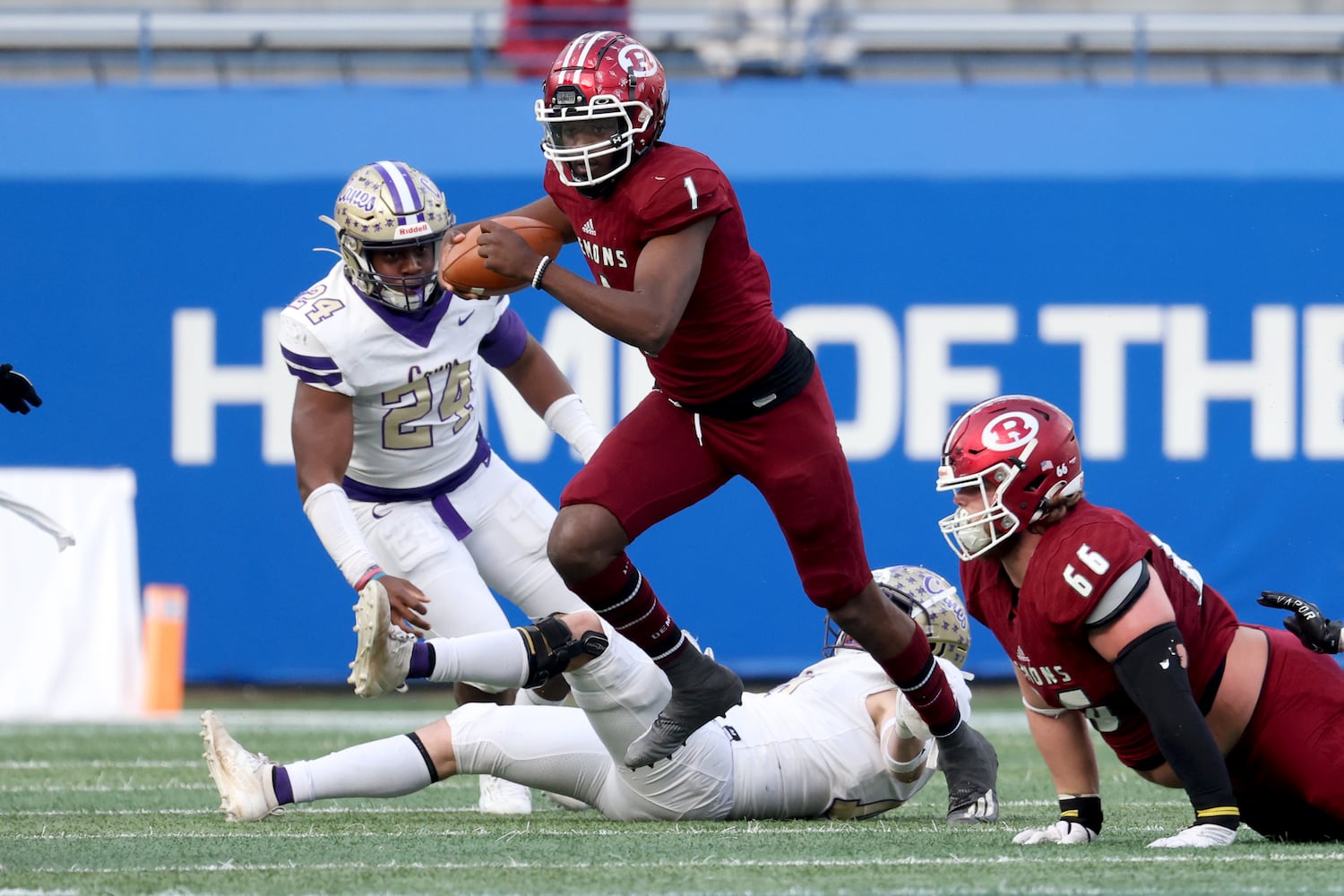 Warner Robins quarterback Jalen Addie (1) rushes for yards in the first half against Cartersville during the first half of their Class 5A state high school football final at Center Parc Stadium Wednesday, December 30, 2020 in Atlanta. JASON GETZ FOR THE ATLANTA JOURNAL-CONSTITUTION