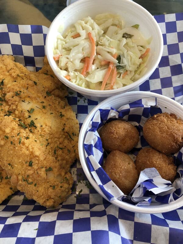 The fried catfish with coleslaw and hush puppies at Trederick’s downtown. CONTRIBUTED BY WENDELL BROCK