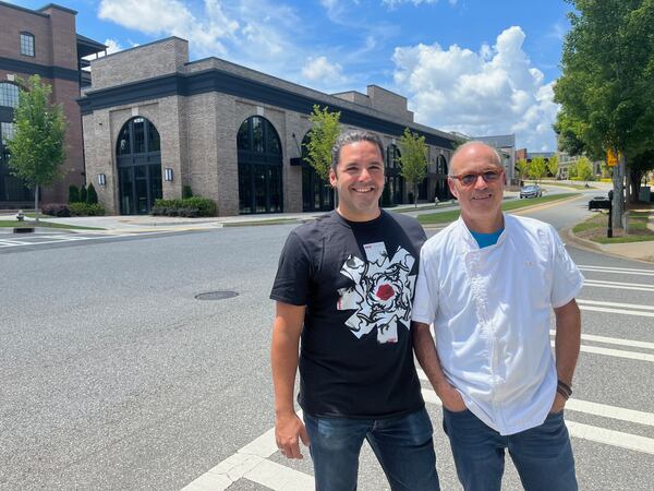 Chef Jamie Adams and Leonardo Moura of Lagarde American Eatery outside Crabapple Market.