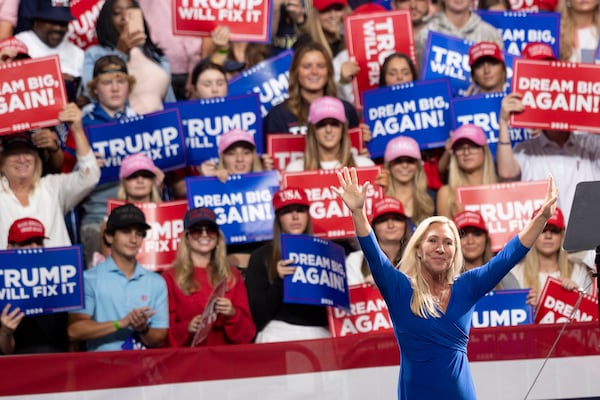 Rep. Marjorie Taylor Greene takes the stage during a rally for former President Donald Trump in Macon on Sunday, Nov. 3, 2024.   Ben Gray for the Atlanta Journal-Constitution