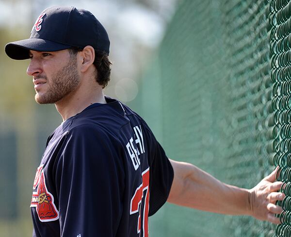 February 13, 2013 Kissimmee, Fl: Atlanta Braves starting pitcher Brandon Beachy stretches using a fence during the second day of pitchers and catchers workouts at Champion Stadium in the ESPN Wide World of Sports Complex in Lake Buena Vista, Fla., on Wednesday, Feb. 13, 2013. HYOSUB SHIN / HSHIN@AJC.COM Brandon Beachy left Monday's game against Philadelphia after two innings due to biceps tightness.