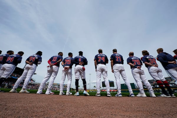 Braves players line up before a 2024 spring training game.