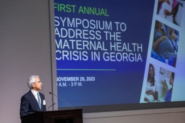 Maternal health leaders and workers in Georgia and elsewhere convened at an Emory University conference on maternal mortality at the Emory Conference Center Hotel on Wednesday, Nov. 29, 2023. Georgia Commissioner of Public Health Dr. Kathleen Toomey gave the keynote address.  Dr. Ravi Thadhani, executive vice president for health affairs at Emory University, seen here in this photo, acted as host. Daniele Fallin, the dean of public health at Emory's Rollins School of Public Health, gave closing remarks.   (PHOTO courtesy of Emory University, by Jenni Girtman)