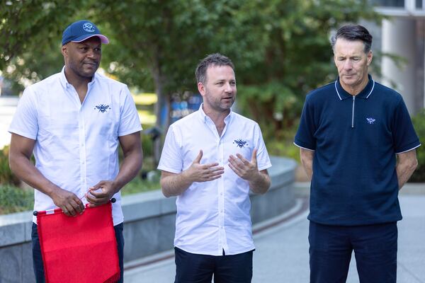 (L-R) Marcus Gayle, ambassador for Brentford Football Club; Greig Mailer, corporate affairs director for Brentford Football Club; and Gary Blissett, ambassador for Brentford Football Club; appear in a press conference at Emory University Hospital in Atlanta on Wednesday, July 26, 2023. Emory teamed up with with Brentford Football Club to promote the importance of an emergency response plan in athletics. (Arvin Temkar / arvin.temkar@ajc.com)