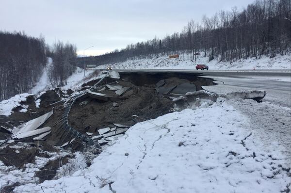 Damage from an earthquake is seen on the Glenn Highway southbound lanes between Eklutna and Mirror Lake, in Alaska, Friday, Nov. 30, 2018. A 7.0 magnitude temblor hit on Friday morning. DOT project engineer Rod Cummings said the inbound lanes of the highway will be closed for several days, but the highway is open and inbound traffic will be routed around the area until crews can repair the damage.