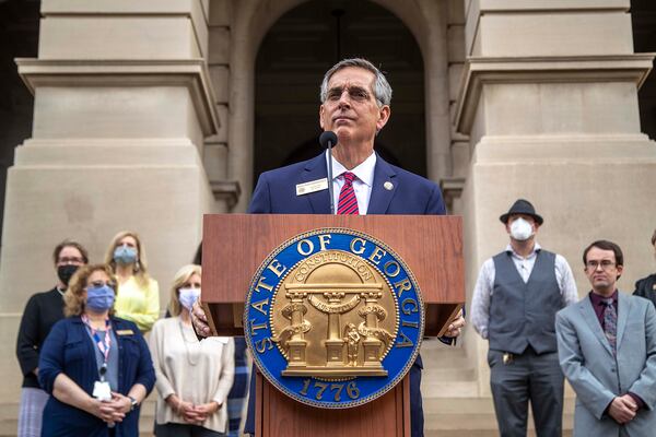 With a handful of Georgia county elections directors behind him, Georgia Secretary of State Brad Raffensperger announces the start of a hand recount of the November 3 presidential election during a briefing outside of the Georgia State Capitol building in downtown Atlanta on Wednesday, November 11, 2020. (Alyssa Pointer/Atlanta Journal-Constitution/TNS)