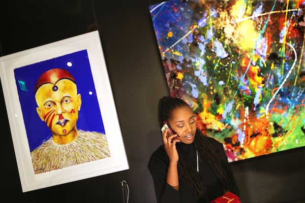 Owner Lakeysha Hallmon works to open her store The Village at Ponce City Market that will include curated art work from Zucot Gallery for sale on Monday, Nov 23, 2020, in Atlanta.   “Curtis Compton / Curtis.Compton@ajc.com”