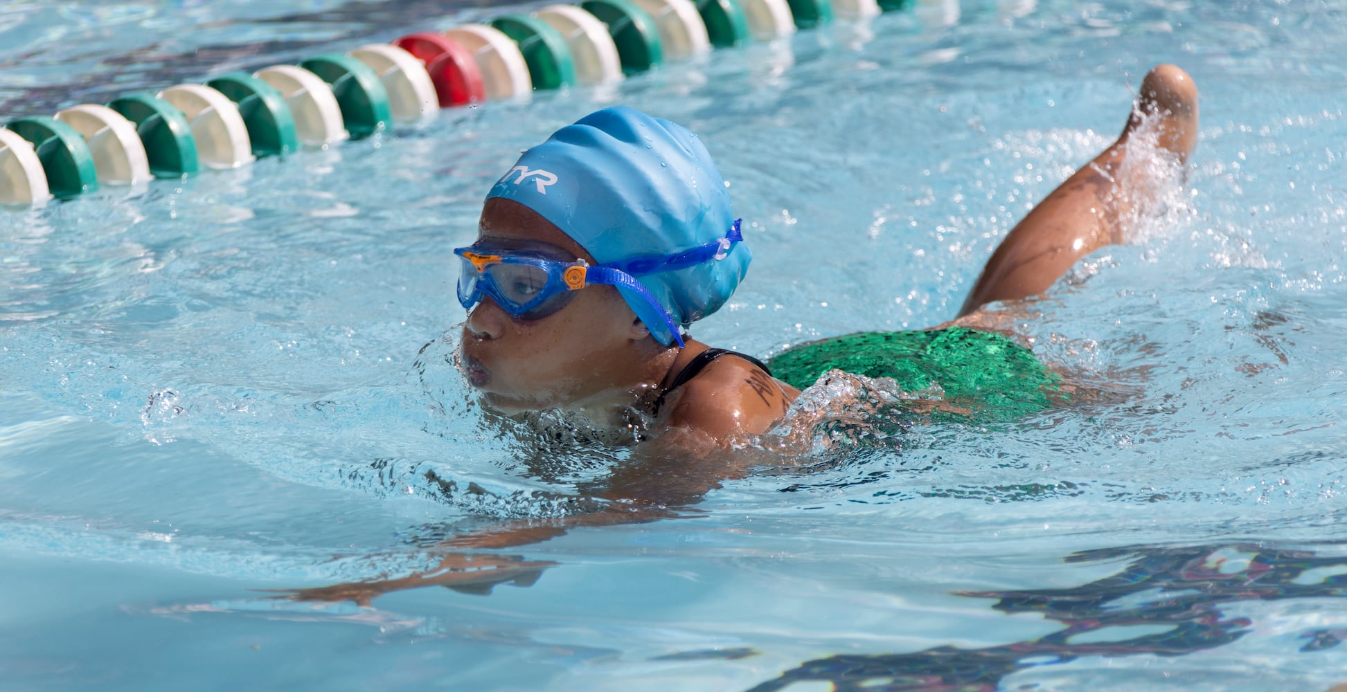 Ava Middlebrook , 8, competes in the breast stroke in a swim meet at Leslie Beach Club in Atlanta on Saturday, May 21, 2022.    According to the USA Swimming Foundation, while most Americans learn how to swim during childhood, 64% of Black children in America have little to no swimming ability. (Bob Andres / robert.andres@ajc.com)