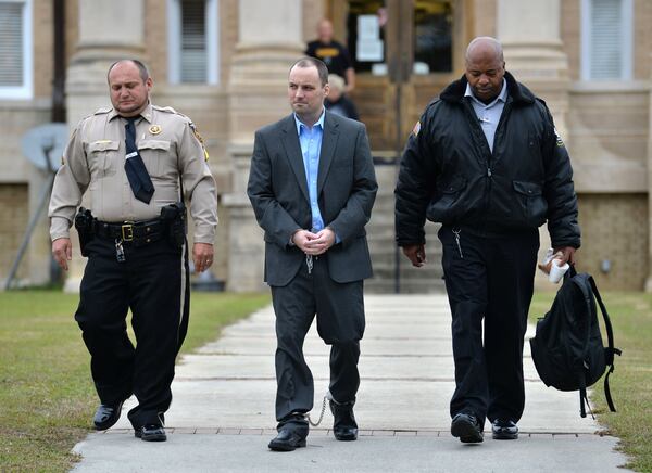 November 26, 2018 Ocilla - Ryan Alexander Duke, charged with the murder of Tara Grinstead, is escorted out after his motion hearings before Chief Judge of the Tifton Circuit Bill Reinhardt at Irwin County Courthouse in Ocilla. HYOSUB SHIN / HSHIN@AJC.COM