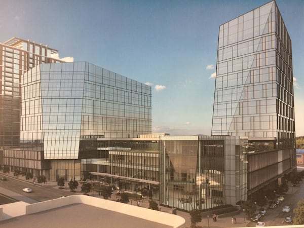 This rendering shows the first and second phases of Spring and 8th Street, the headquarters campus of financial technology firm NCR. The first tower, right, opened Monday, NCR said. The second is expected to open later this year. Source: Cousins Properties, NCR, Duda Paine Architects, HKS and Kimley-Horn