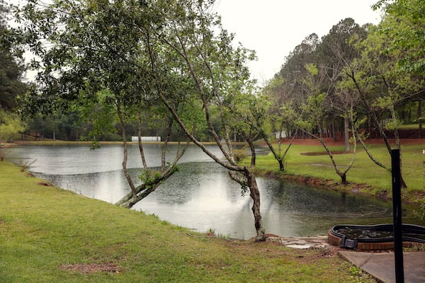 Views of Lake Sheryl located on the Livsey family property in Snellville shown on Friday, April 14, 2023. The Livsey family says that Gwinnett County is attempting to acquire 10 acres of the land through eminent domain. (Natrice Miller/ natrice.miller@ajc.com)