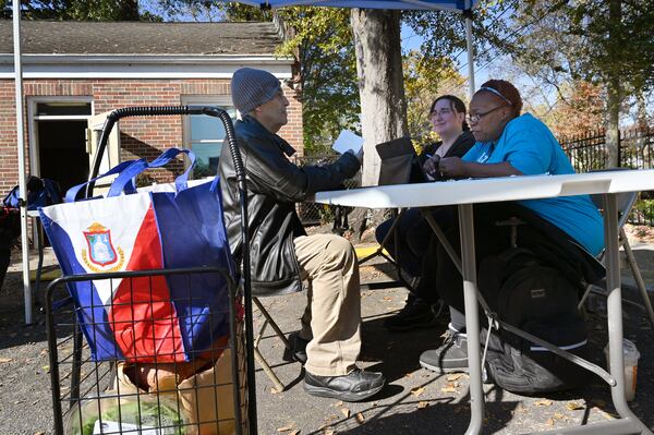 The charity Intown Cares helps people navigate the safety net, including Medicaid, when they can't figure out state websites or reach someone on the phone. (Hyosub Shin/hyosub.shin@ajc.com)