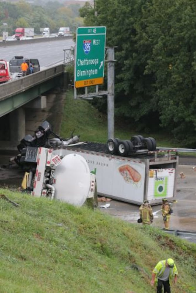 I-285 crash: Trucks plunge off interstate onto Ga. 400