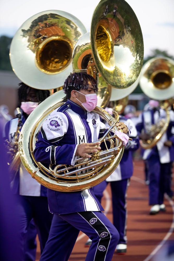 A Miller Grove Marching Band tuba player walks to the stands during a GHSA high school football game between Stephenson High School and Miller Grove High School at James R. Hallford Stadium in Clarkston, GA., on Friday, Oct. 8, 2021. (Photo/Jenn Finch)