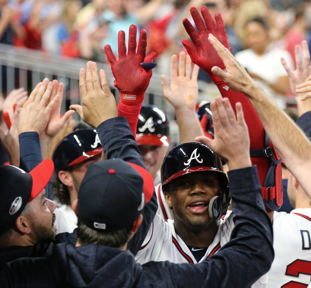 Photos: Acuna, Freeman lead Braves to playoff win over Dodgers