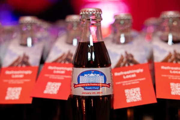 An inauguration themed Coca Cola bottle is seen at the Peachtree Ball at Union Station in Washington on Saturday.