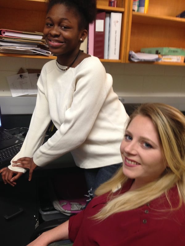 Jemariya Patterson, left, is pictured with Kara Thompson, site coordinator of Communities In School at Stockbridge High School. Patterson credits Thompson with turning her life around. Photo by Gracie Bonds Staples/AJC.COM